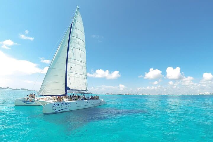 Isla Mujeres Catamaran Adventure: Snorkel, Spinnaker and Beach Club Lunch