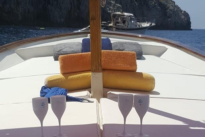 Private Capri Boat Tour: Swim, Prosecco & Limoncello Along the Faraglioni photo 2