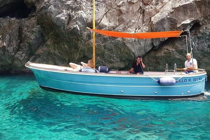 Private Capri Boat Tour: Swim, Prosecco & Limoncello Along the Faraglioni photo 3