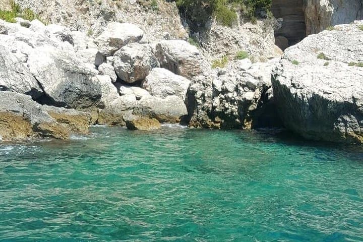 Private Capri Boat Tour: Swim, Prosecco & Limoncello Along the Faraglioni photo 4