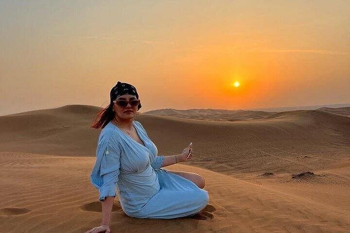 Evening Desert Safari in Lahbab: Camel Rides, Falcon Photos, BBQ & Live Shows photo 3