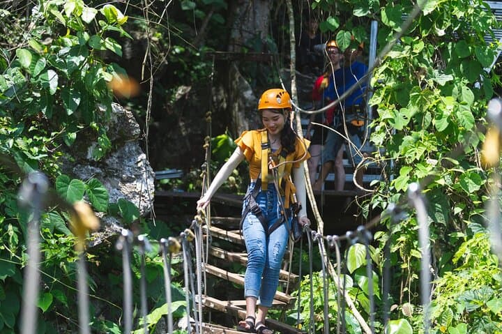 Vang Vieng 1-Day Cave Exploration: Kayak, Tubing & Zipline Adventure photo 1