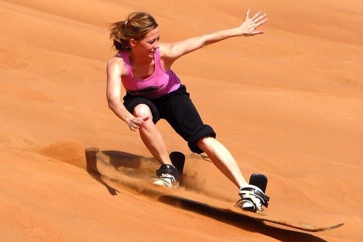 Evening Abu Dhabi Desert Safari with BBQ Dinner, Dune Bashing & Falcon Experience photo 6