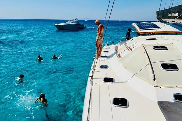 Private Mykonos Catamaran Cruise to Delos & Rhenia with Meals and Drinks photo 3