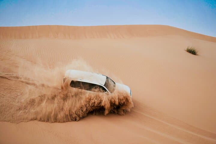 Evening Desert Safari Abu Dhabi: Dune Bashing, Camel Rides & BBQ Under the Stars