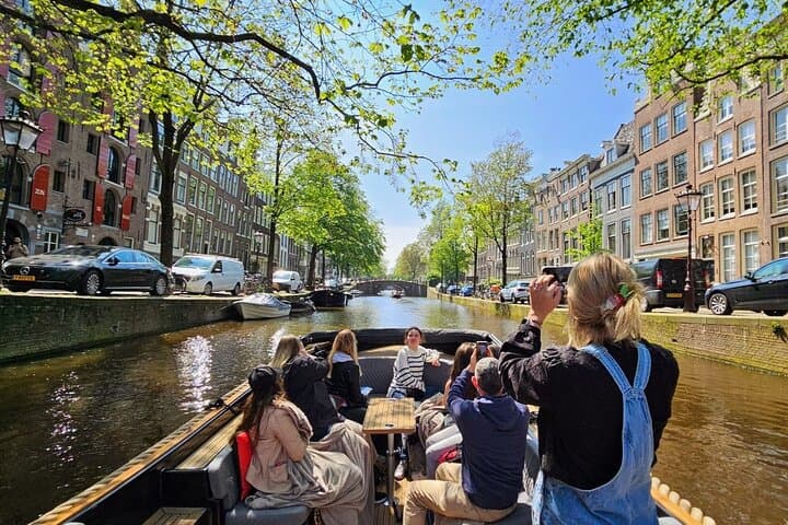 Amsterdam Electric Open-Boat Canal Cruise — 90-Min Small-Group Tour