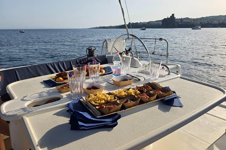 Catania Sunset Sailing: Aperitif, Swim & Intro to Sailing along the Cyclops Riviera photo 4