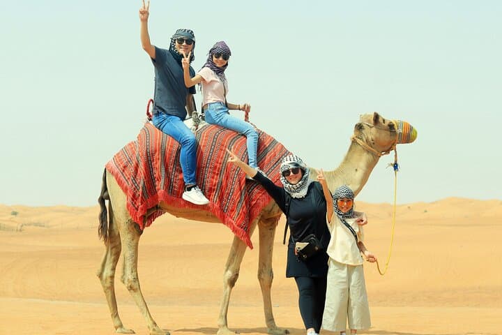 Dubai Desert Safari: Dune Bashing, Camel Ride & BBQ Camp Experience photo 4