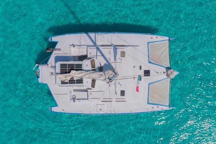 Private Catamaran Cruise to Isla Mujeres: Snorkel, Open Bar & Beach Club photo 1
