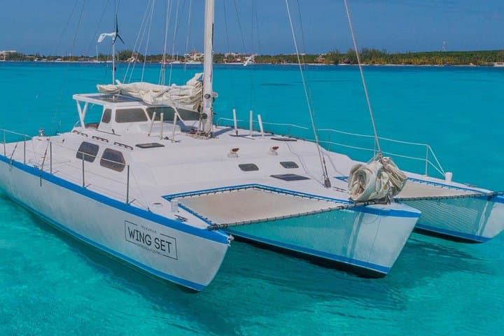 Private Catamaran Cruise to Isla Mujeres: Snorkel, Open Bar & Beach Club photo 3