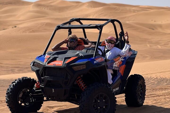 Sunrise Red Dunes Buggy Safari: Sandboarding & Camel Ride in Lahbab Desert photo 5