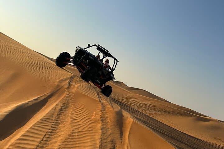 Sunrise Red Dunes Buggy Safari: Sandboarding & Camel Ride in Lahbab Desert photo 3