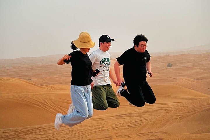 Sunrise Red Dunes Buggy Safari: Sandboarding & Camel Ride in Lahbab Desert photo 6