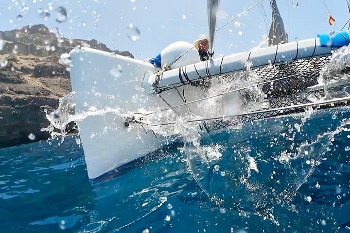 Solar-Powered Catamaran Eco Tour — Snorkel, Paddle & Paella off Gran Canaria