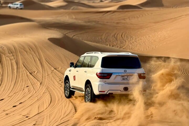 Premium Lahbab Desert Safari: Evening Dune Drive, Dinner & Live Show in Dubai photo 2