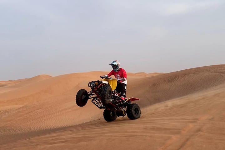Evening Red Dunes Desert Safari with Quad Bike, BBQ & Camel Ride in Dubai photo 2
