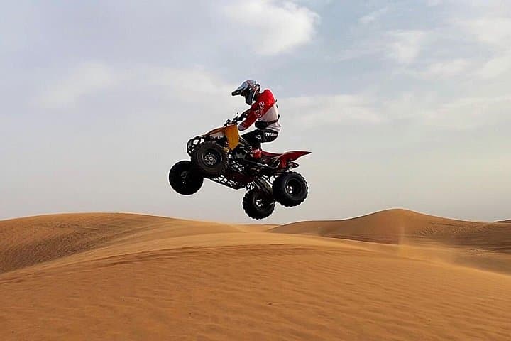 Evening Red Dunes Desert Safari with Quad Bike, BBQ & Camel Ride in Dubai photo 3