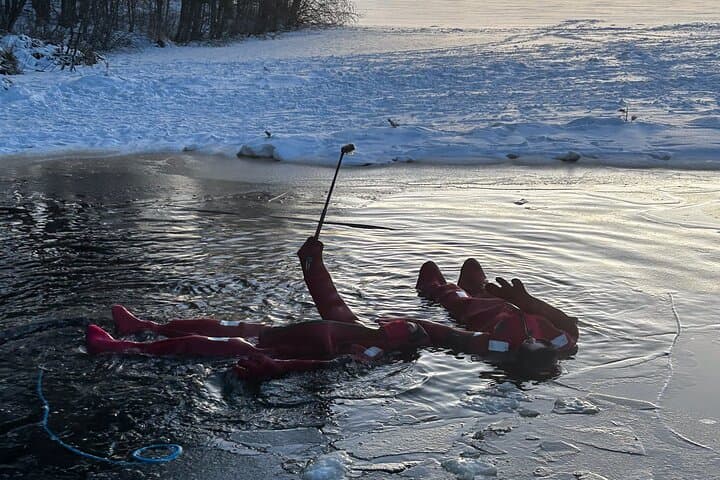 Arctic Ice Floating Experience in Rovaniemi — Cold-Water Survival Float in Lapland photo 4