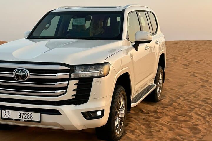 Private Luxury Dubai Desert Safari with Premium Camp, Dune Bashing & BBQ photo 2