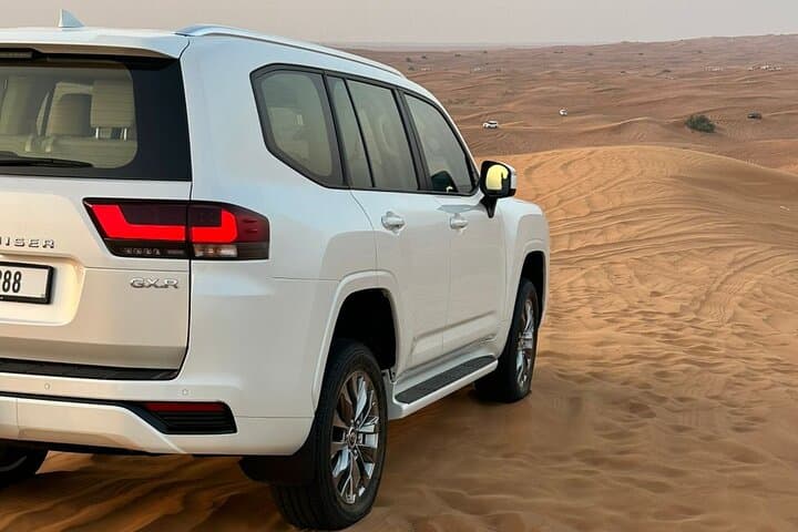 Private Luxury Dubai Desert Safari with Premium Camp, Dune Bashing & BBQ photo 3
