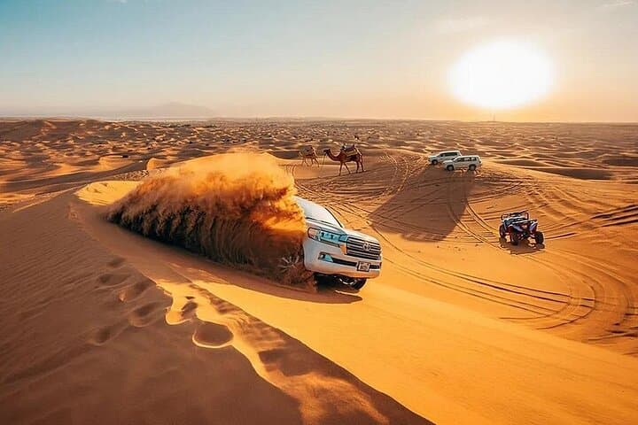 Red Dunes Safari in Lahbab: Camel Rides, Dune Bashing & Desert Camp Experience
