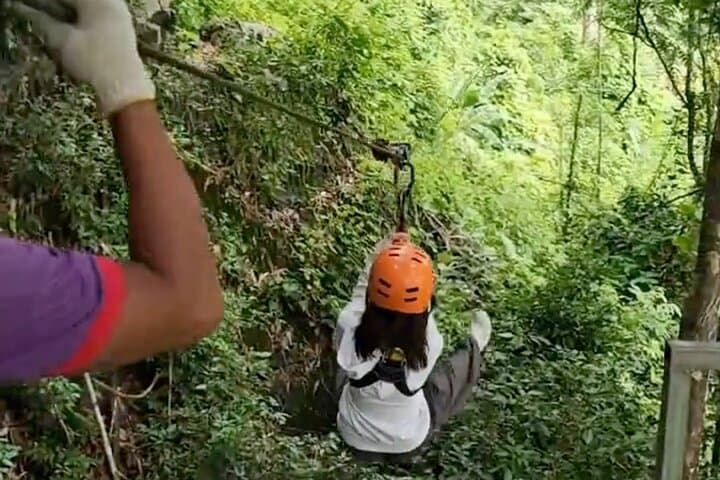 Vang Vieng Jungle Day Trip: Zipline, Cave Tubing & Blue Lagoon Adventure photo 1