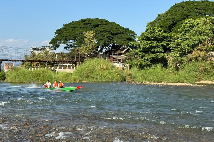 Vang Vieng Paragliding and Longtail Boat Tour with Hotel Pickup photo 4