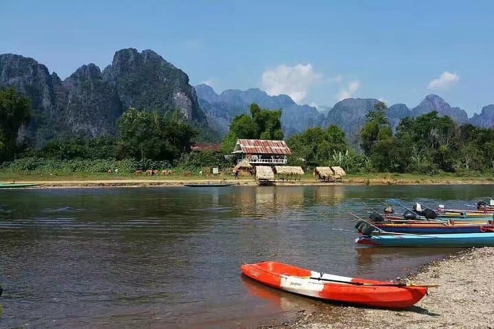 Vang Vieng Paragliding and Longtail Boat Tour with Hotel Pickup photo 3