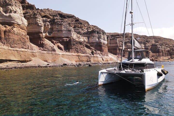 Santorini Platinum Half-Day Catamaran: Red Beach, Hot Springs & Cliffside Views photo 2