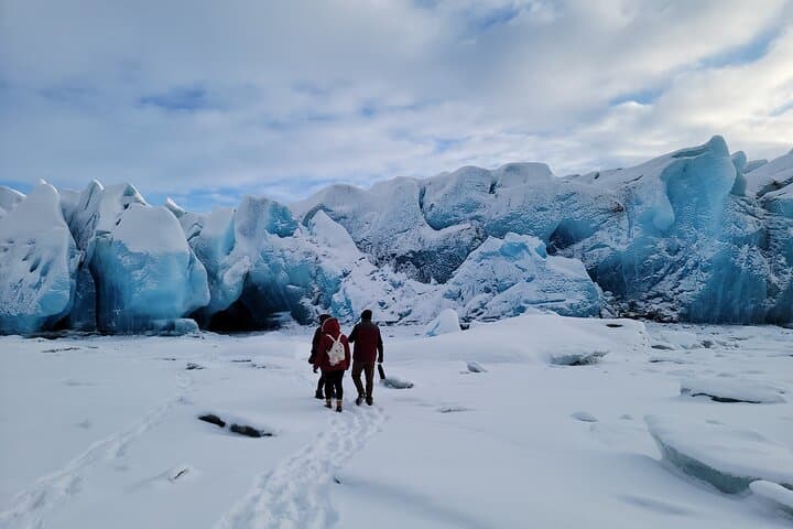 Explore Alaska’s Winter Ice Caves: Helicopter Landing on Knik Glacier