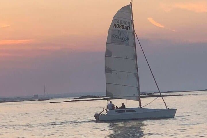 Sunset Catamaran Adventure in Porto Cesareo: Sail, Snorkel & Local Flavors photo 2