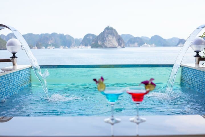 Sweetness Cruise Ha Long Bay — Kayak Sung Sot Cave, Swim Ti Top & Lunch photo 4