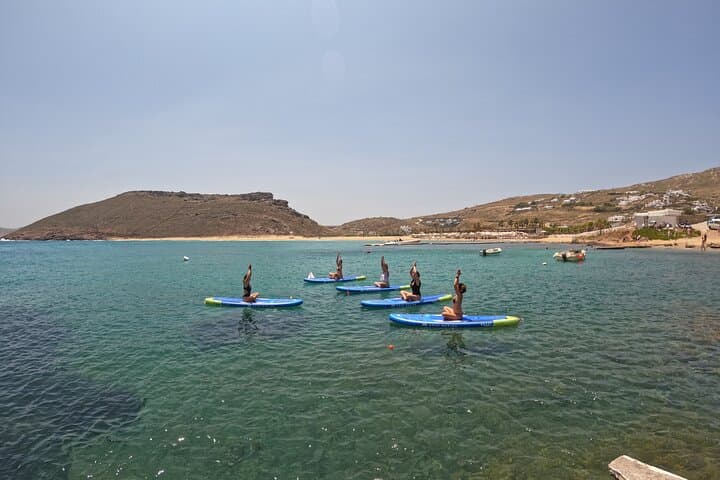 SUP Yoga at Panormos Beach: Mindful Paddleboard Session on Mykonos