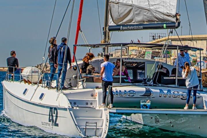 Barcelona Catamaran Cruise: 90-Minute Shared Sail with Swimming and Paddleboarding