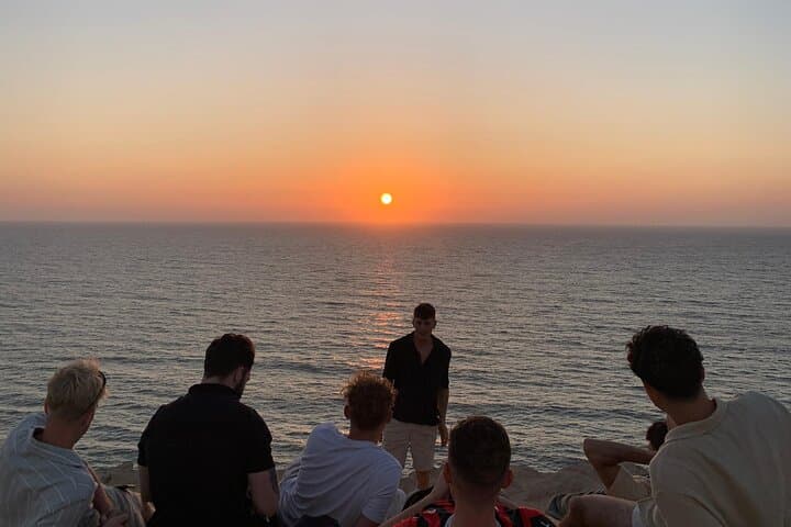 Sunset Sandboarding in Taghazout Dunes: Bonfire, Tea & Camel Ride photo 3