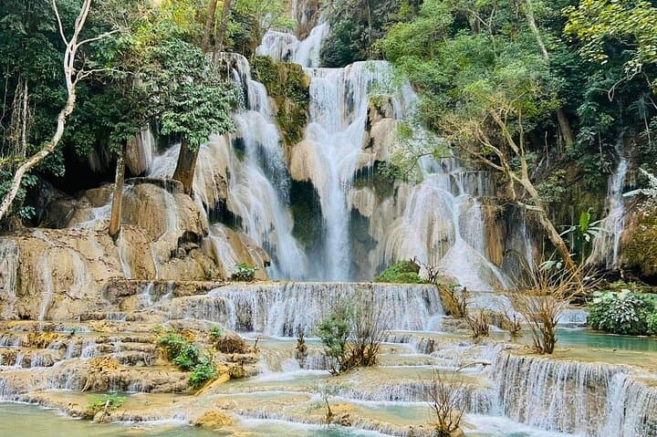 Pak Ou Caves & Kuang Si Falls Day Tour from Luang Prabang: Mekong Cruise, Buddha Caves & Hmong Village