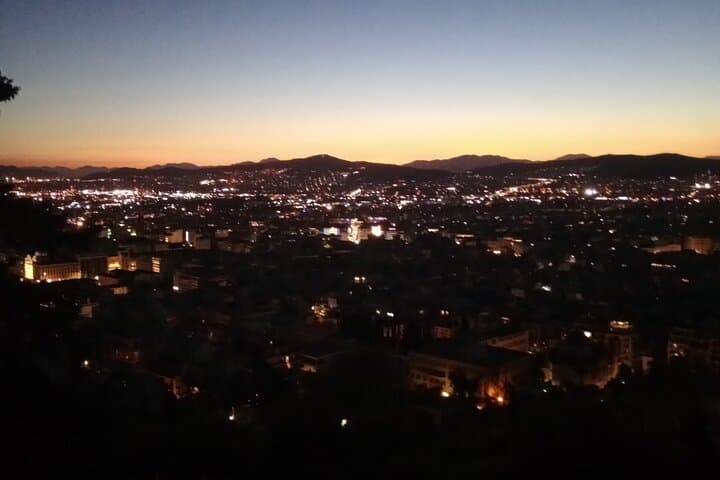 Athens After Dark: Private Night Driving Tour with Food & Dance