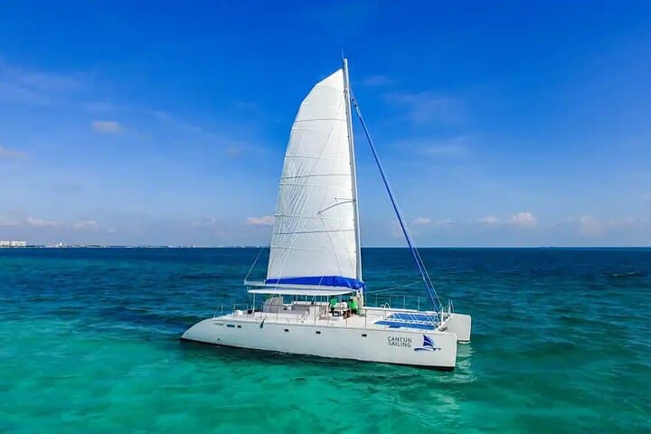 Isla Mujeres Catamaran Adventure: Snorkel, Spinnaker and Beach Club Lunch photo 3