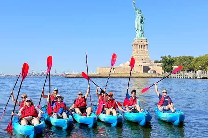 Paddle Beneath the Icon: Kayak Adventure Near Lady Liberty