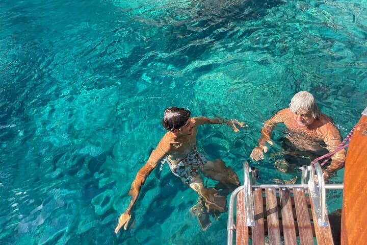 Capri Private Boat Tour: Blue Grotto, Faraglioni & Hidden Coves photo 2