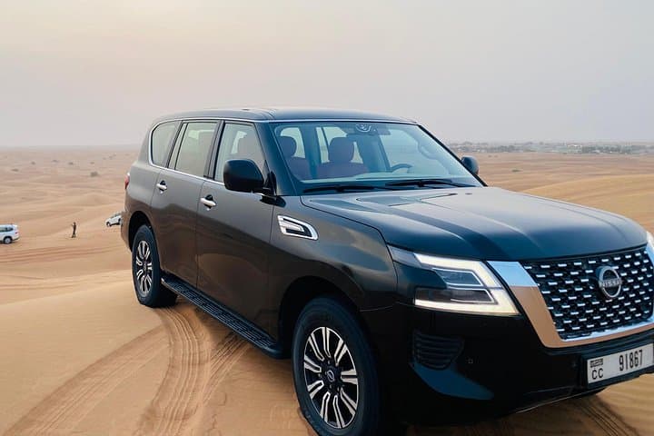 Red Dunes Desert Safari Dubai: Evening Dune Bashing, Camel Ride & BBQ photo 2