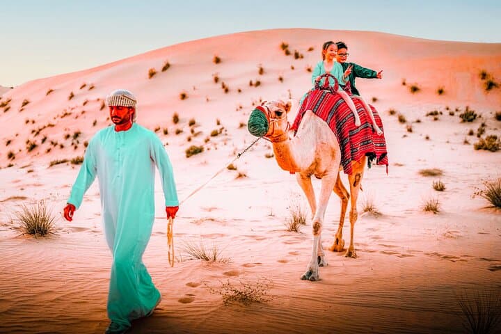 Abu Dhabi Morning Dune Drive, Camel Ride & Sandboarding — Half-Day Desert Safari