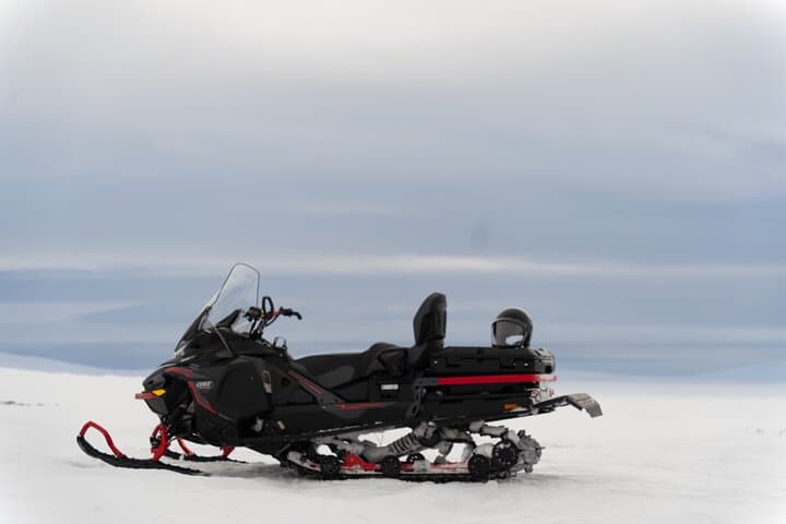 Explore Swedish Lapland: Thrilling Snowmobile Tour on the Frozen Torne River photo 4