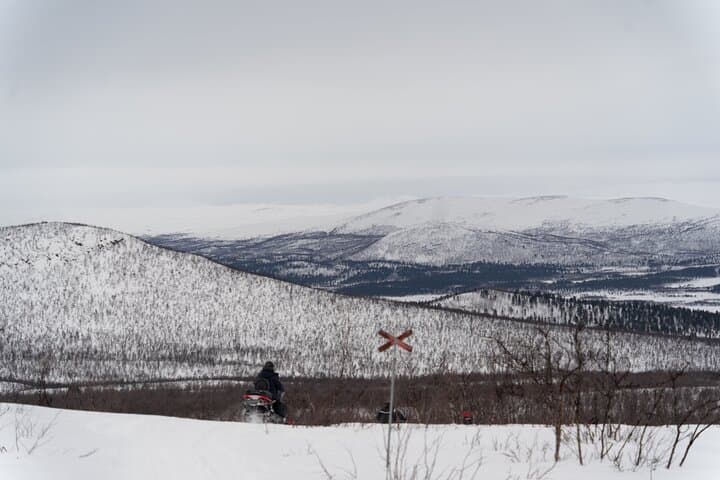 Explore Swedish Lapland: Thrilling Snowmobile Tour on the Frozen Torne River photo 5