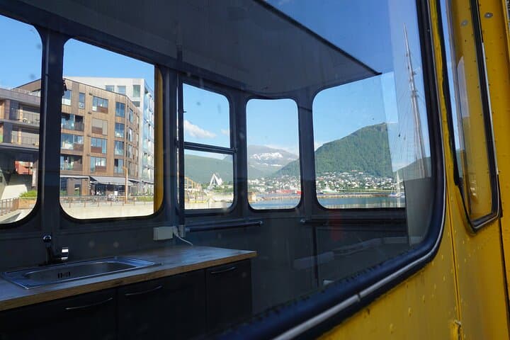 Arctic Capital Run: Guided 6km Tour of Tromsø's Fjords and History photo 2
