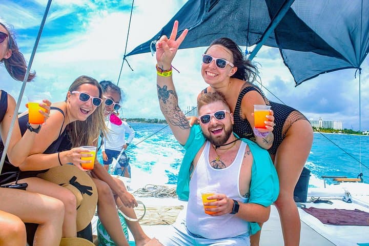 All-Day Isla Mujeres Catamaran Cruise — Snorkel, Open Bar & Ice Bar Experience photo 1