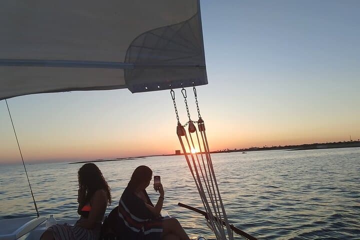 Sunset Catamaran Adventure in Porto Cesareo: Sail, Snorkel & Local Flavors photo 3