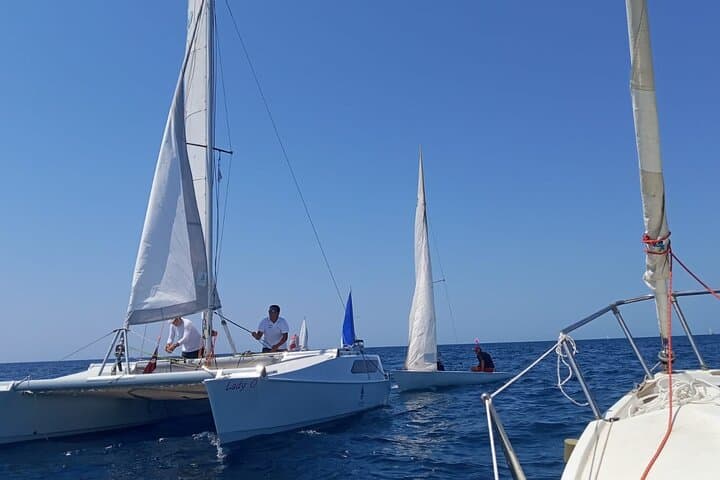 Sunset Catamaran Adventure in Porto Cesareo: Sail, Snorkel & Local Flavors photo 5