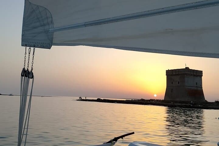 Sunset Catamaran Adventure in Porto Cesareo: Sail, Snorkel & Local Flavors photo 6