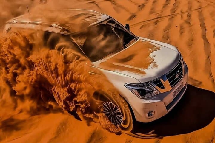VIP Red Dune Safari in Dubai: 4x4 Dune Bashing, Camel Ride & BBQ Night photo 2